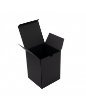 Черная продолговатая коробка для упаковочного спрея